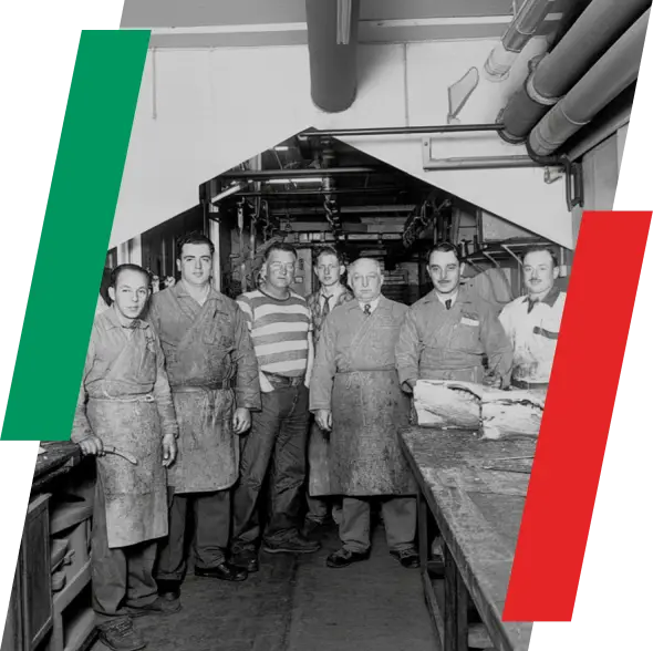 Historic photo of the Flocchini family team in their original butcher shop
