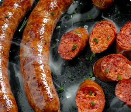 Smoked sausage links and sliced cuts prepared in small batches using traditional smokehouse methods